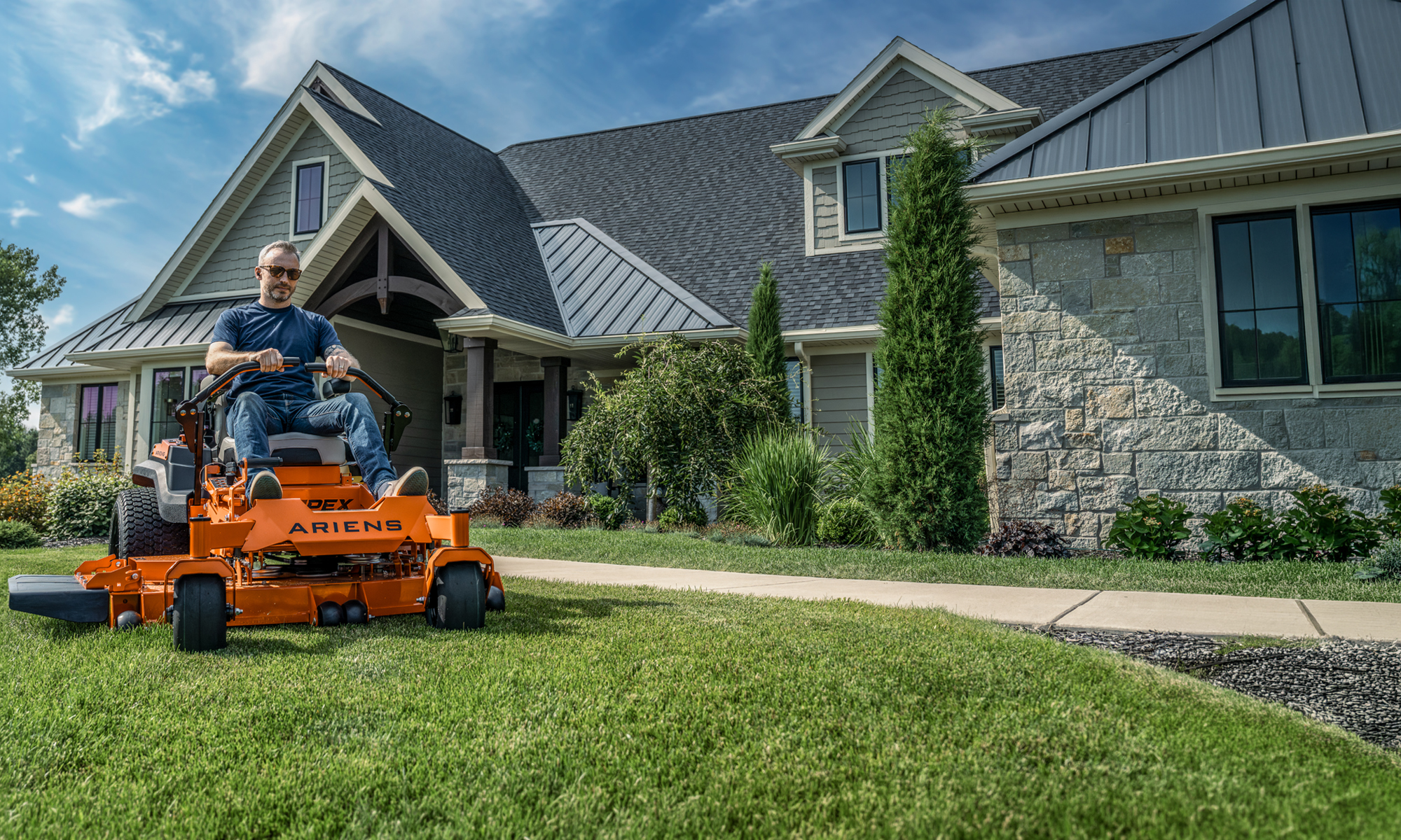 Ariens APEX zero-turn mower on a residential lawn