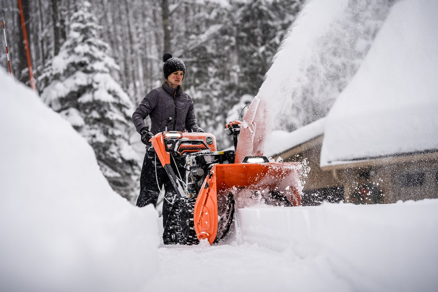 250107-ariens-snow-blog-hero-(1).jpg Ariens Alpine Edition snow blower throwing heavy snow